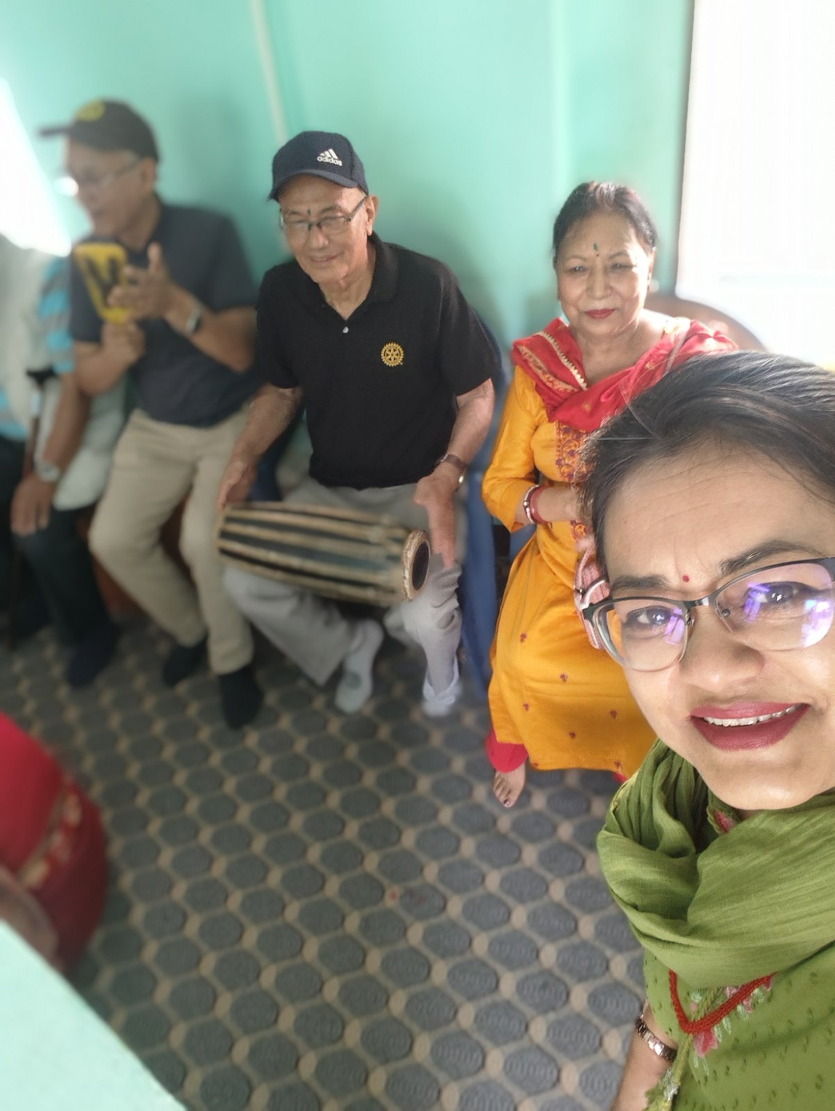 Jhula program and food distribution to Senior Citizen
